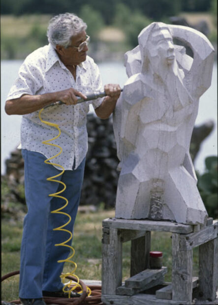 Medellin carving a sculpture