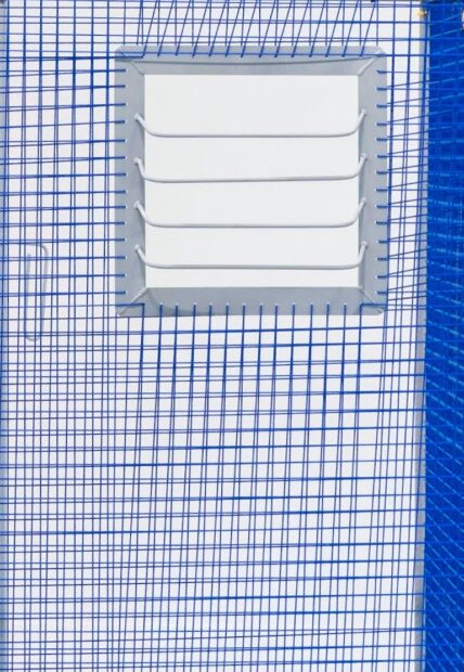 An image of a work by Ariel Wood featuring a grid of blue strings.