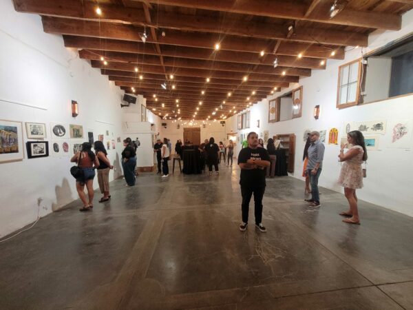 Image of visitors in a juried exhibition