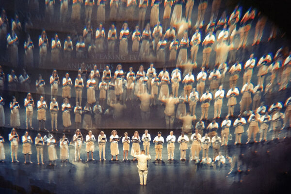 A photograph of a choral performance.