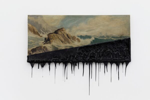 An artwork by Minerva Cuevas, that features a landscape painting dipped in tar.