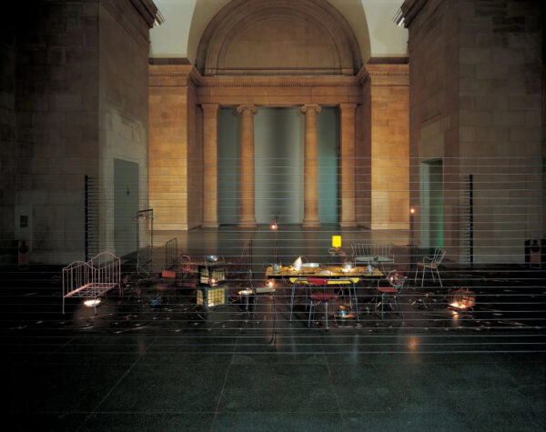 An installation image of a work by Mona Hatoum with a wide range of furniture and objects that have been electrified.