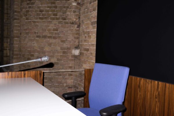 Photo of a purple chair behind a podium