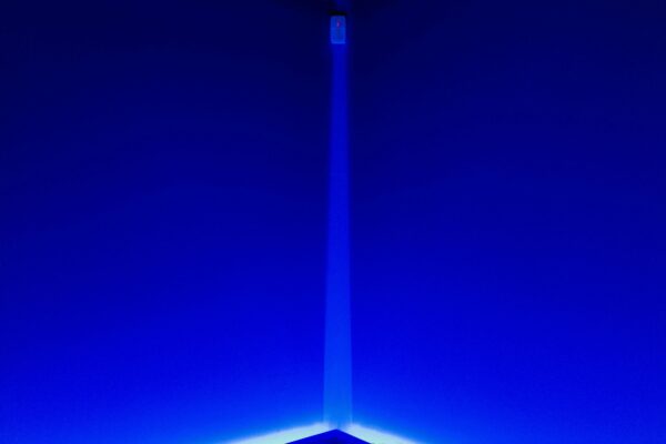 Corner of a room bathed in blue light