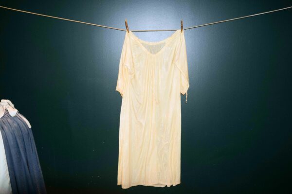 Photo of a dress hanging on a clothesline
