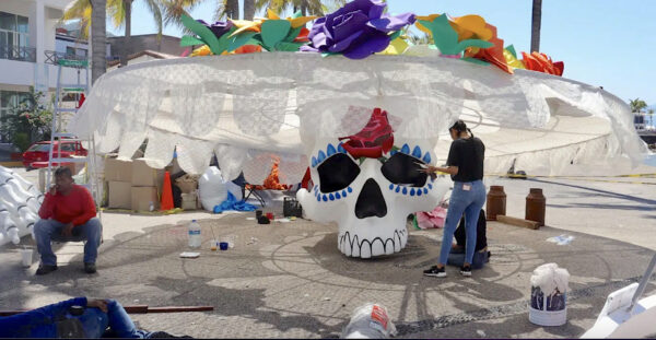 Photo of a catrina face being painted