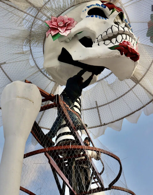 Photo of the underside of a large catrina sculpture