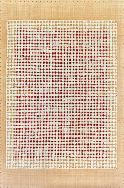 An artwork featuring a grid of white paper over other colored elements.