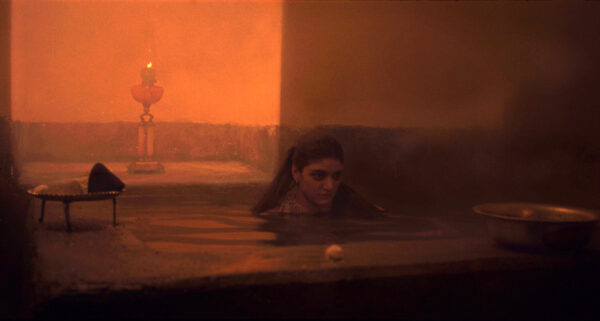 video still of a woman in a pool