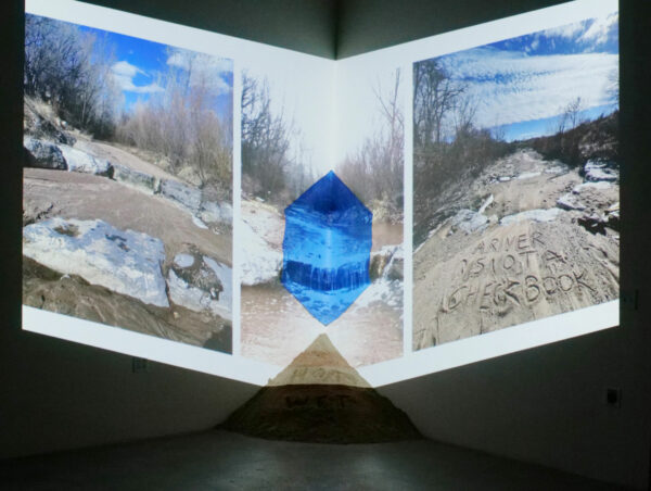 Projected Triptych on a sand formation