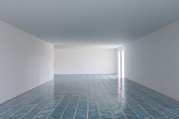 A photograph of a blue tiled floor by artist Sarah Crowner.