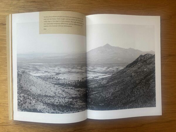 Photo of a mountainous landscape in a photo book