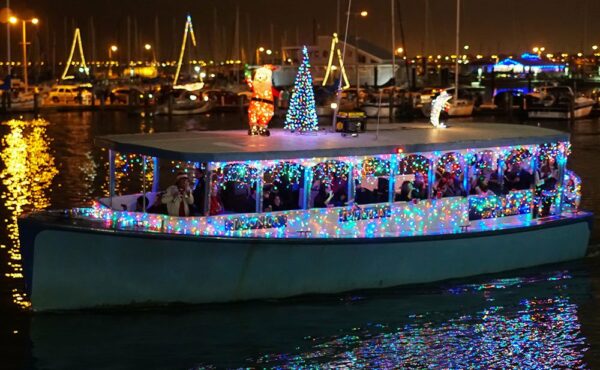A photograph of a lighted boat.