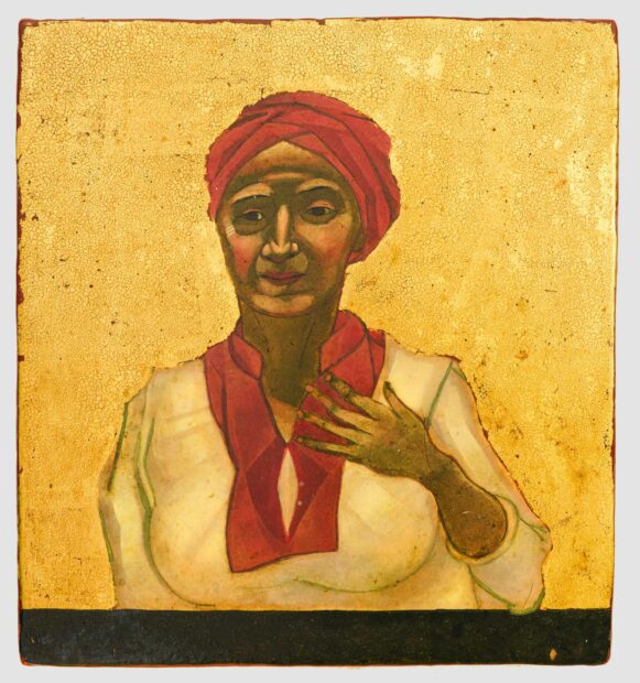 Portrait of a woman with her hand on her chest