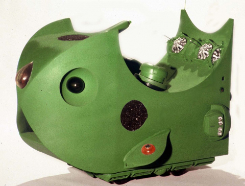 A green anthropomorphic robot.