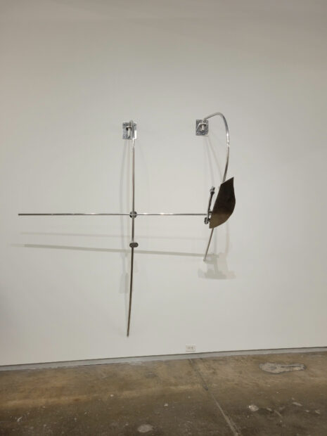 Installation of a steel sculpture on the wall
