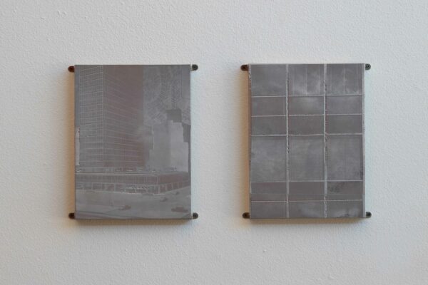 Installation view of two works on a wall