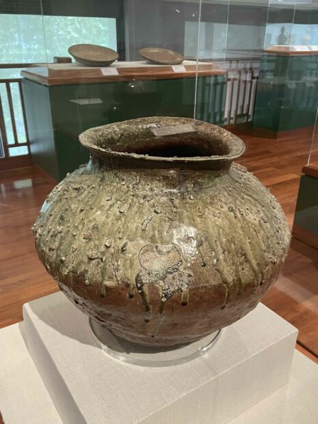 Installation view of a ceramic vessel with ash