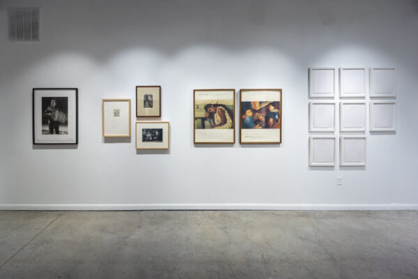 Installation view of two dimensional works on a wall
