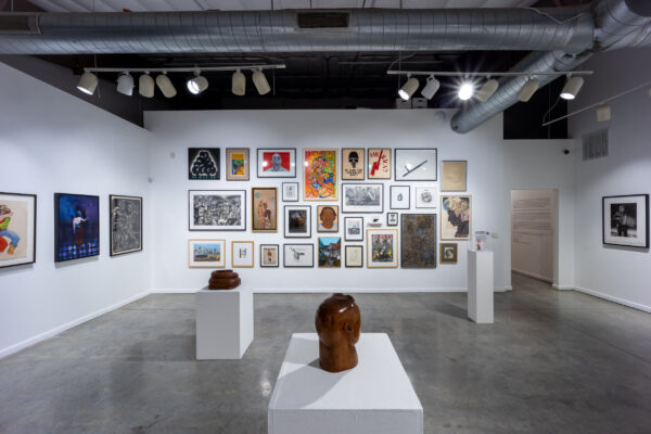 Installation view of two dimensional works on a wall