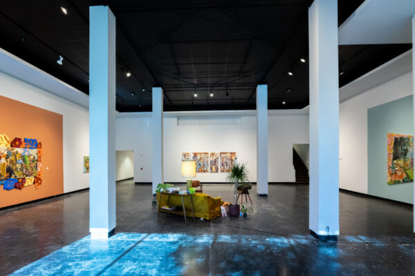 Installation view of a living room as part of an exhibition