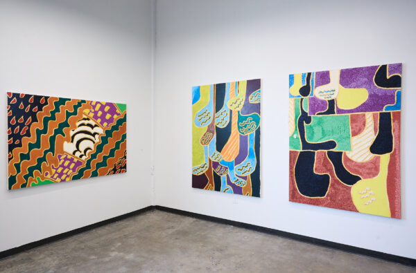 Installation view of large scale paintings on white walls