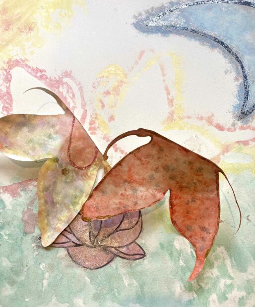 Photo of a watercolor with paper butterflies collaged on top