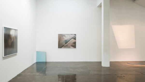 An installation of works by Jessica Mallios in a white walled gallery.