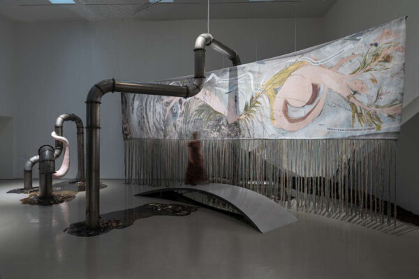 Installation view of a large scale tapestry by Laure Provoust