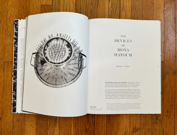 A photograph of the inside of "Mona Hatoum: Terra Infirma," published by The Menil Collection.