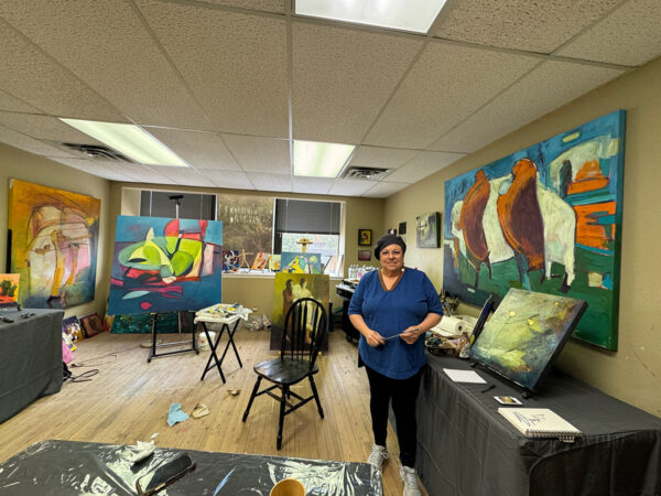A photograph of artist Patty Rae Wellborn in her studio at the Center for Contemporary Arts in Abilene.
