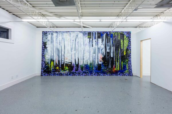 Installation view of a large painting on tarp