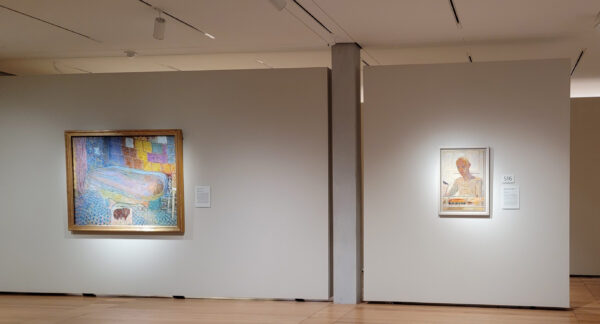 Installation view of two paintings on a wall