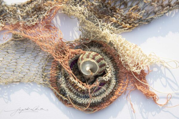 Photo of a net with a shell