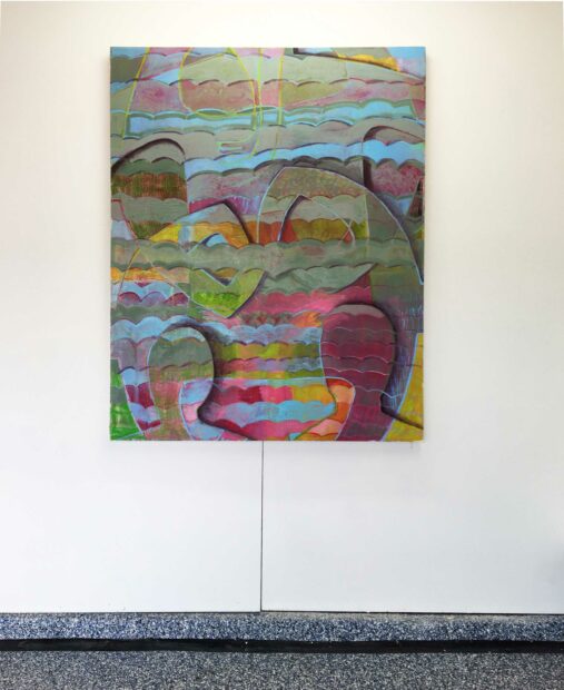 Installation view of a multicolored painting with three figures