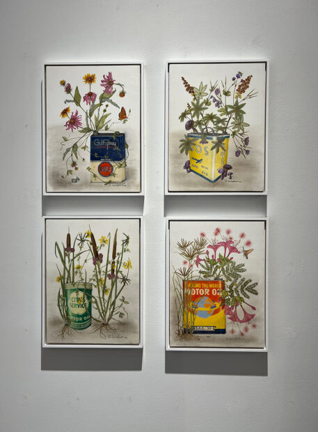 A photograph of a grid of four paintings featuring antique watercans with flowers coming out of the spouts.