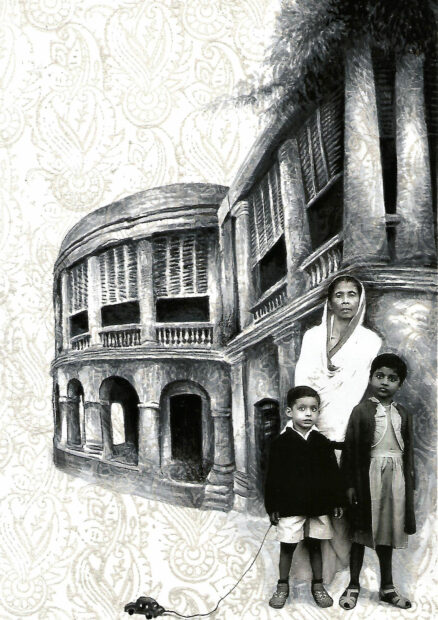 Photo of a woman with two children standing in front of a building