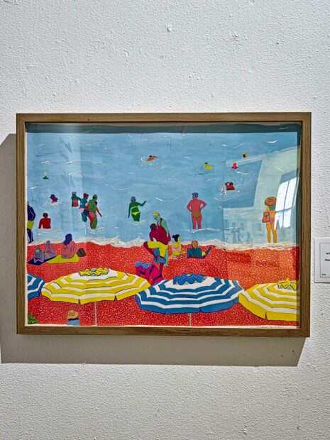 Technicolor painting of people on a beach