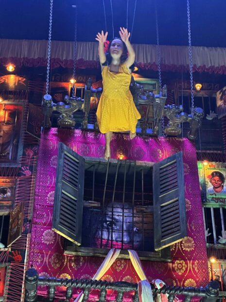 Image of a female deity hanging from the ceiling