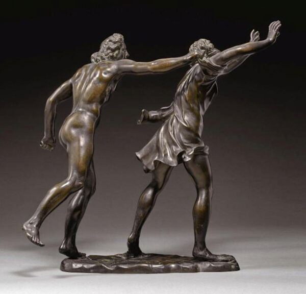 Bronze sculpture of a nude male and a clothed female