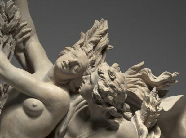 Detail of the faces of a marble sculpture of Apollo and Daphne