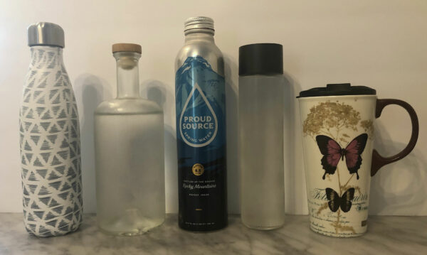 Photo of reusable water bottles and coffee cups