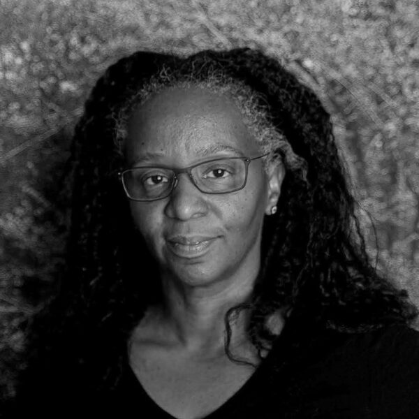 A black and white photograph of artist Letitia Huckaby.