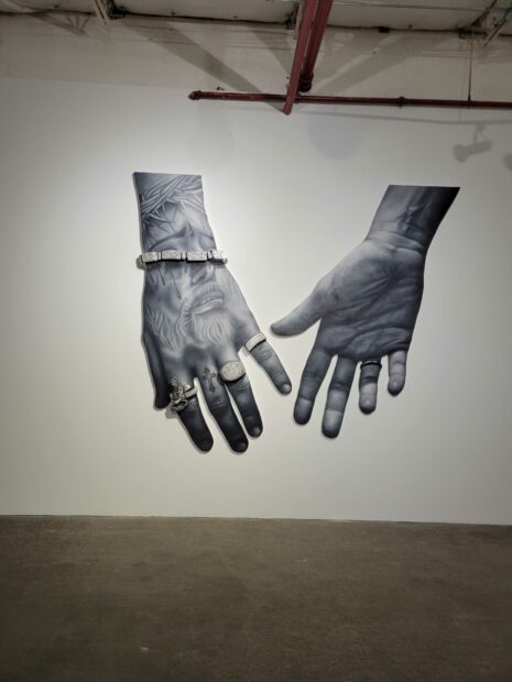 Large scale wall work of two hands