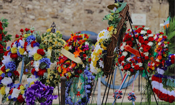 Funerary wreaths in front of the alamo