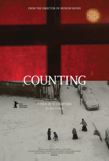 Photo of a promotional image for the film "Counting" showing a scene with people in snow on the bottom and a black cross against a red backdrop on top