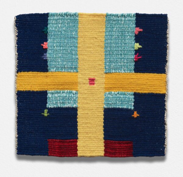 A weaving made of colored thread, with a cross shape going through the middle.