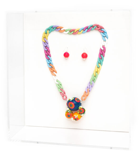 A multicolored necklace and earrings.