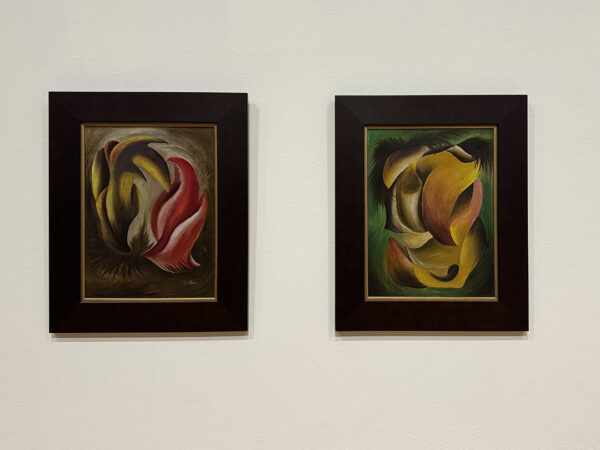 An installation view of two small paintings by Cossette Zeno.