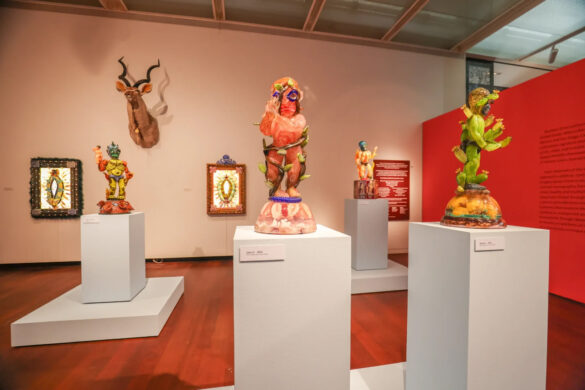 installation view of mixed media sculptures on pedestals and walls
